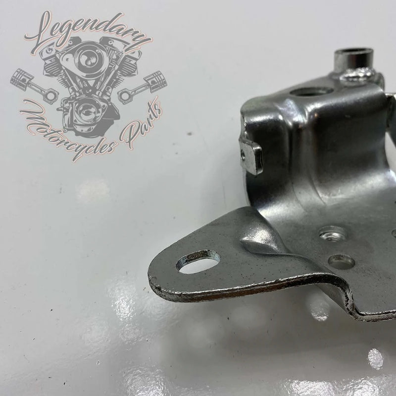 Left rider footrest bracket OEM 33630-87