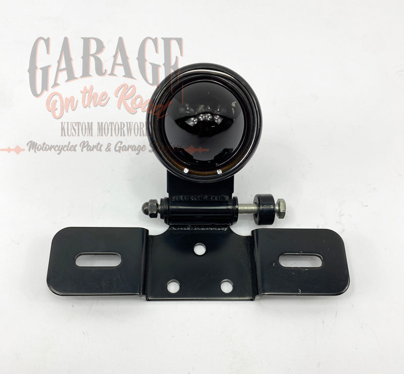 Light and license plate support